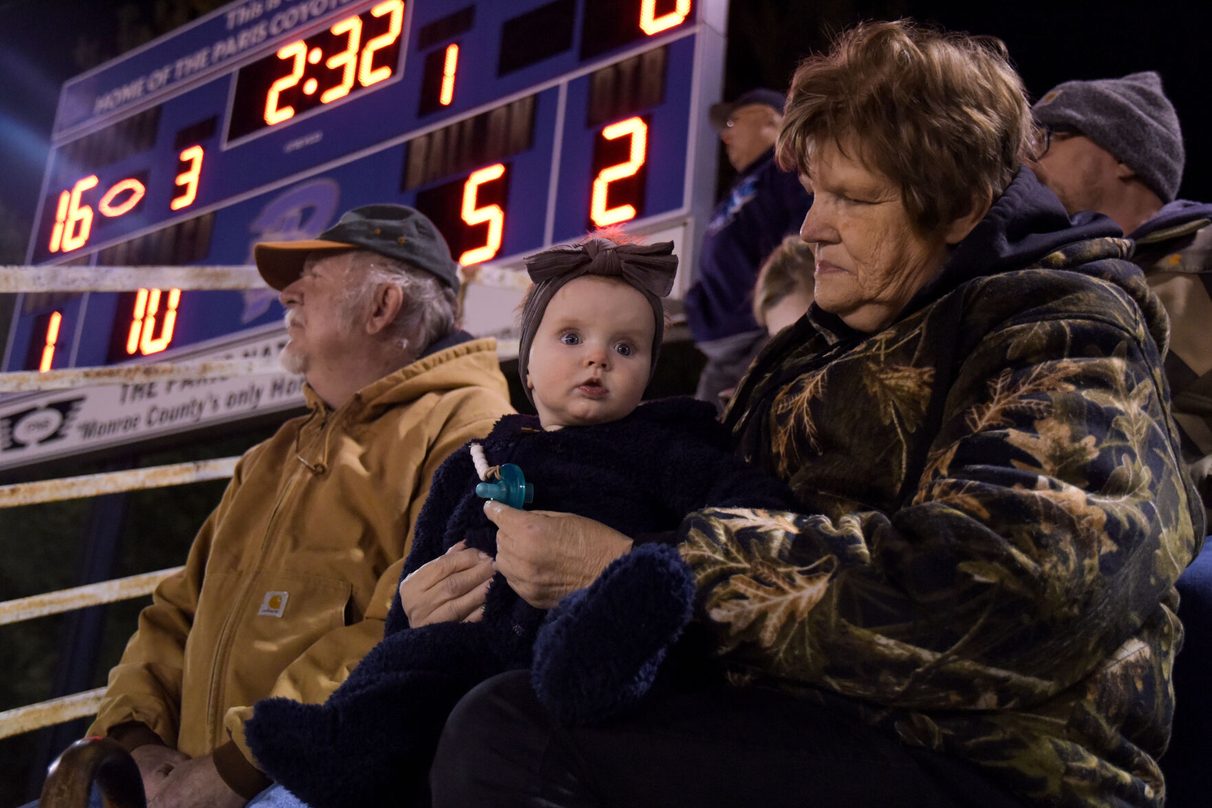 Josephine Schulte, 7 months, bundles up for the cold with her grandparents
